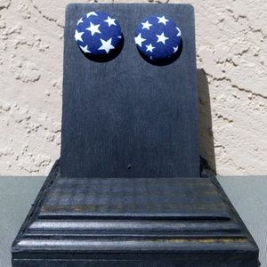 Dark blue star earrings.